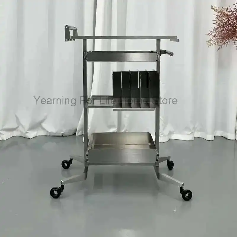 

Metallic Hairdressing Salon Trolley Carty Cosmetic Wheels Multi-functional Trolley Carrello Pieghevole Hospital Nail Polish