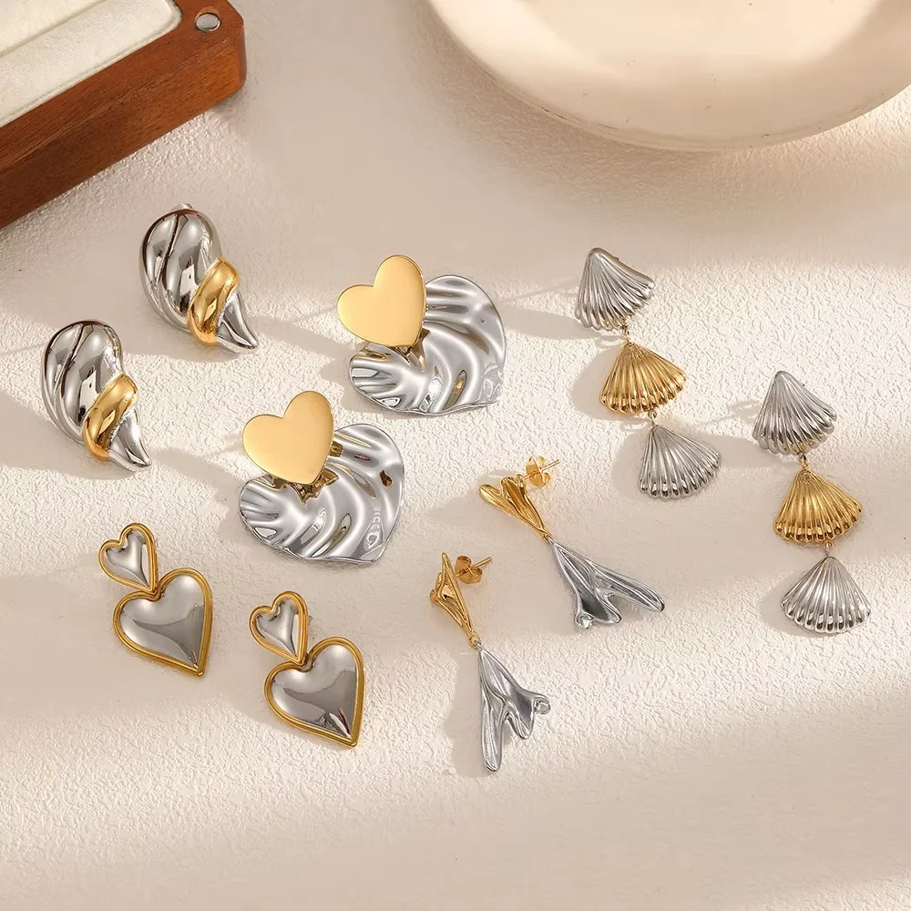 

Simple Creative Fashion Geometric Texture Heart Pendant Earrings Stainless Steel Shell Conch Shaped Earrings
