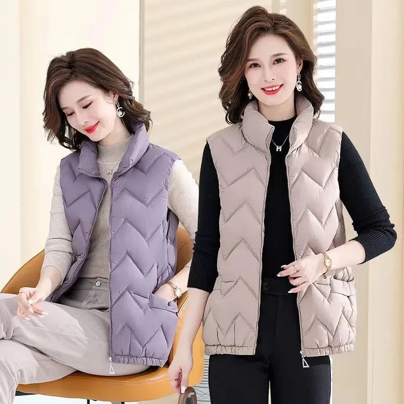 

Women Fashion Autumn New 2025 Stand Collar Elegant Down Coats Warm Outerwear Casual Belt Sleeveless Winter Women Vests Jackets