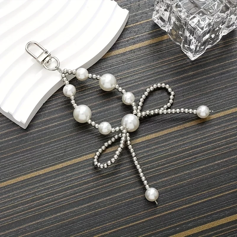 

Holiday party small gifts, birthday gifts, high-end pearl bow hanging chain bags, keychains, phone cases, pendants