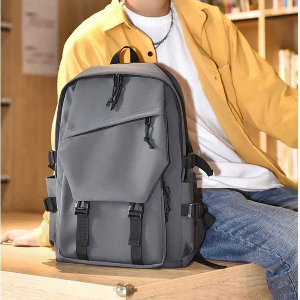 حقيبة ظهر متينة من قماش أكسفورد ذات سعة كبيرة مقاومة للماء متعددة الجيوب حقيبة مدرسية للطلاب حقيبة كمبيوتر محمول بلون سادة للمراهقين