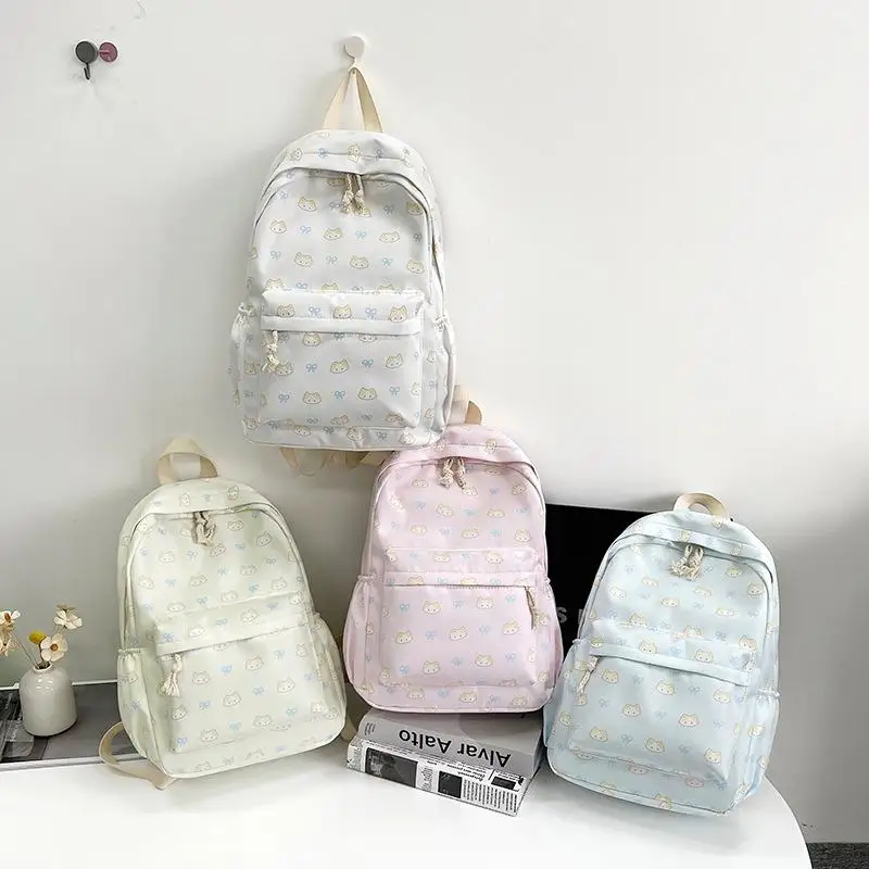 Bolsa con estampado felino de dibujos animados de lujo, bolso de mano escolar de gran tamaño para niños, bolso delicado de moda para niñas, bolsa de viaje compacta, recuerdo