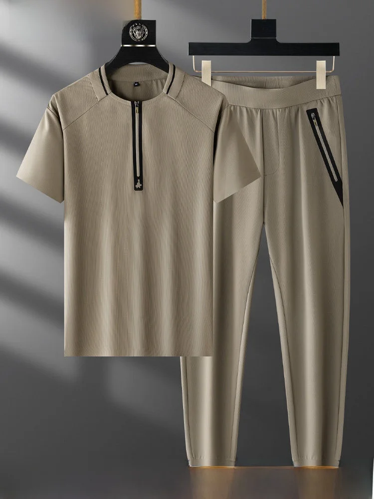 

Летний спортивный костюм из ледяного шелка для мужчин: футболка с круглым вырезом на молнии и брюки с манжетами (длина до щиколотки), комплект из двух предметов для повседневного спорта...