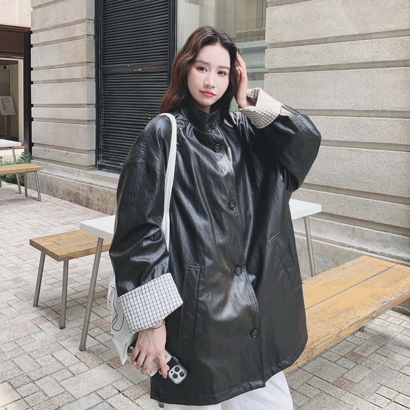 

Women's Korean-Style Vintage Leather Jacket Mid-Length Loose Slimming Versatile Casual Top for Spring 2026
