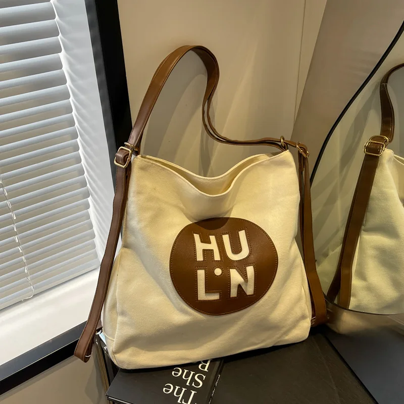 Canvas bag Large capacity multi-purpose backpack Commuter shoulder tote bag