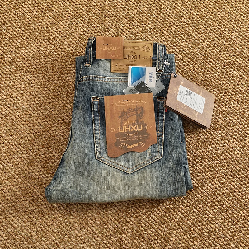 بنطلون جينز رجالي ثقيل الوزن بأرجل مستقيمة باللون الأبيض من قماش الدنيم المطاطي بنطلون طويل جينز صيفي عصري غير رسمي