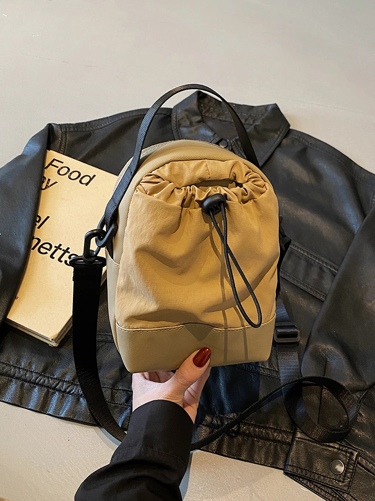 

Модная маленькая сумка через плечо для активного отдыха, сумка для бутылки с водой, портативная сумка для мобильного телефона, повседневная сумка на одно плечо для мужчин и женщин.