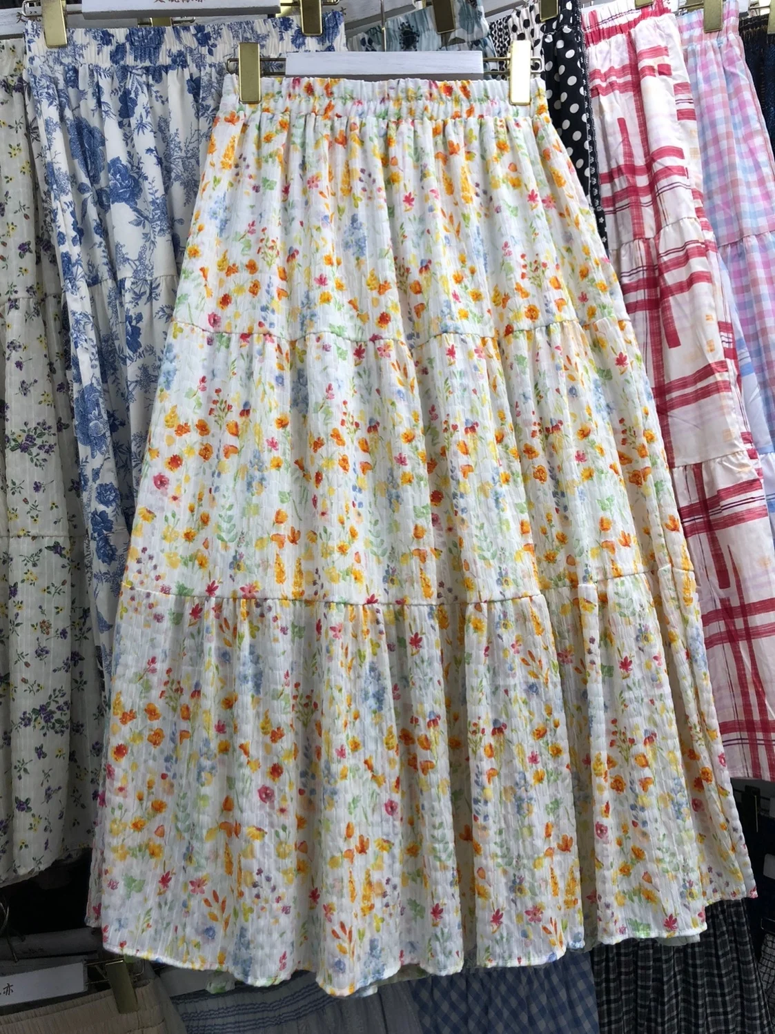 

Юбка-миди с цветочным принтом, высокая талия, А-силуэт, женская, больших размеров, скрывающая недостатки фигуры, летняя, новая модель, полудлинная юбка