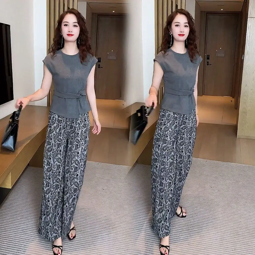 

Летний новый женский повседневный комплект: брюки с широкими штанинами и топ без рукавов с асимметричной линией талии и эластичным поясом