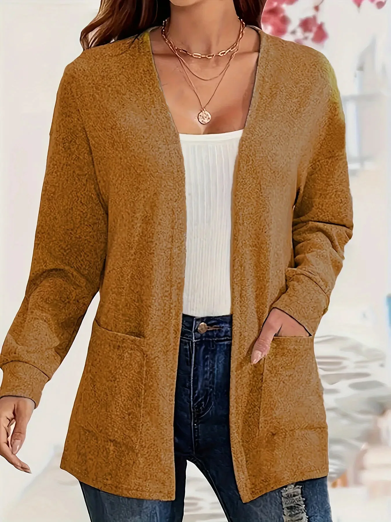 Autumn and winter European and American foreign trade thin fashion solid color pocket thin knitted women's buttonless cardigan