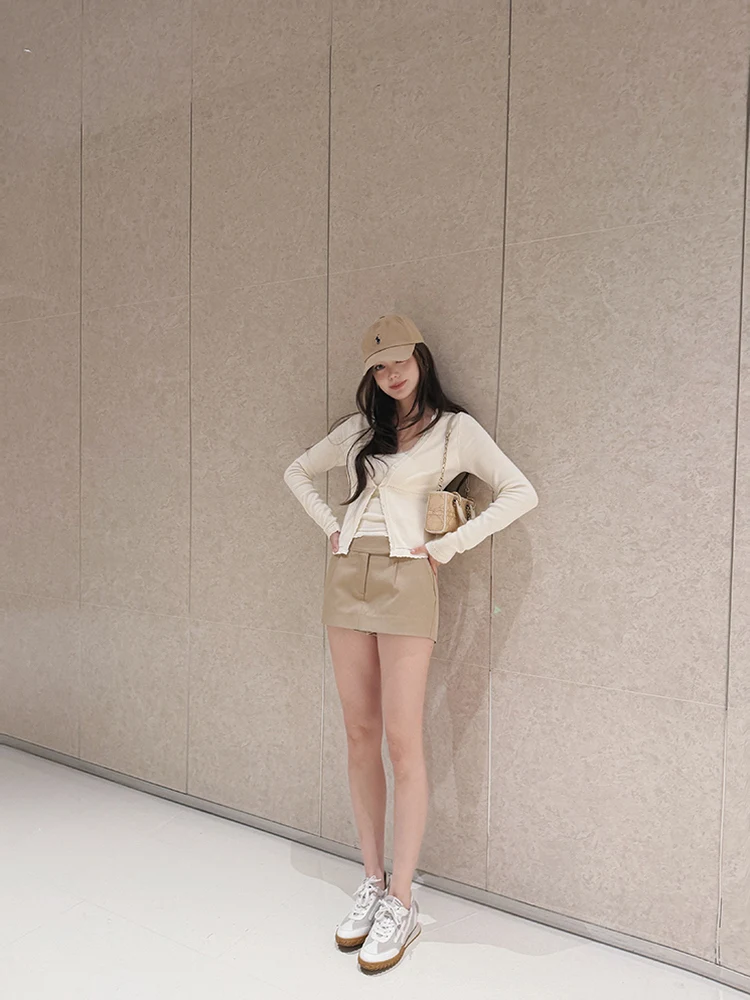 

Модный вязаный комплект из кардигана и жилетки для женщин: короткий и длинный рукав, эластичная резинка, весенний сезон, костюм-двойка от Tan...