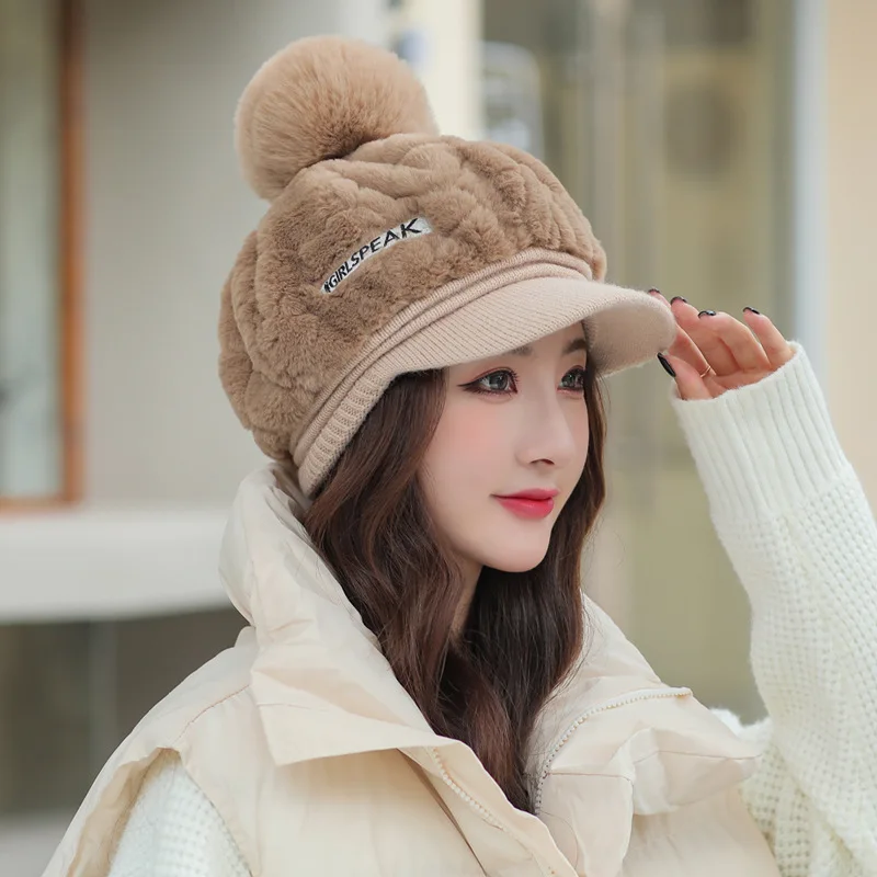 Autumn and winter new women\'s hats fashion wild plush warm duck tongue hat cute hairball cold protective ear cap