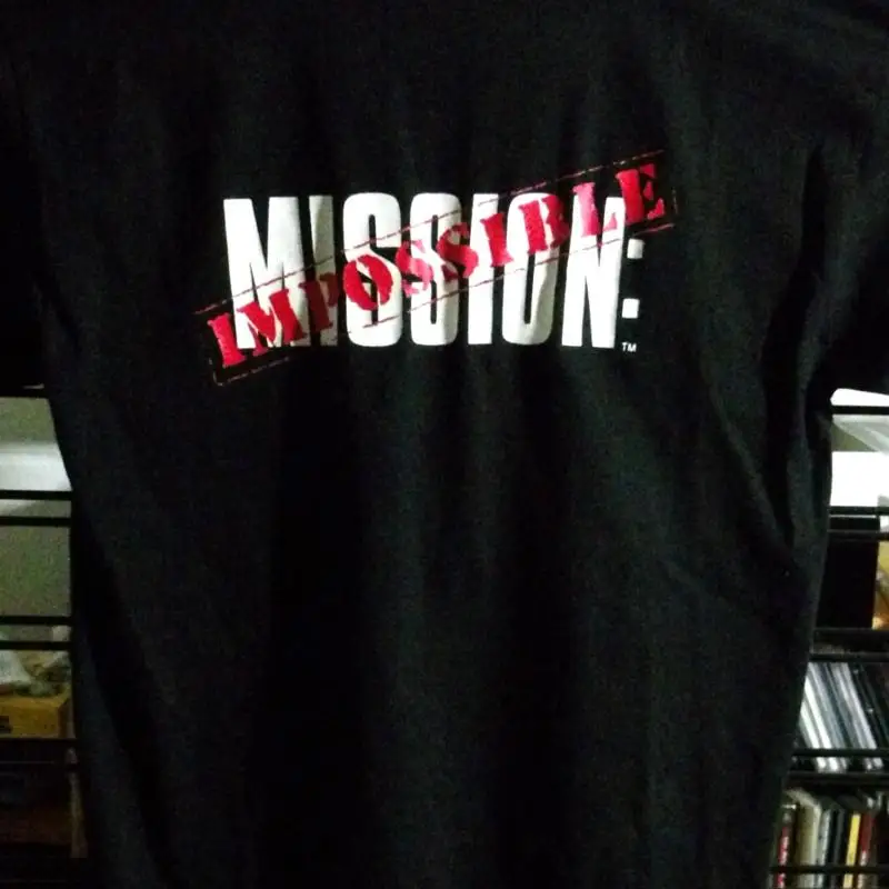 Mission: Impossible 1996 movie logo on back of licensed Adult Lg t-shirt - black