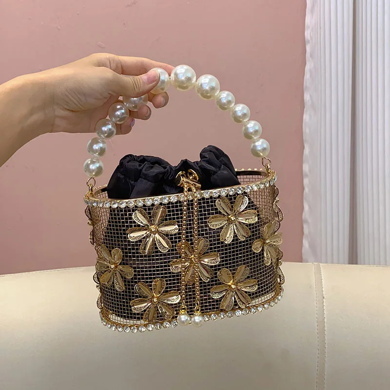 

Metal sunflower pearl vegetable basket bird cage bucket bag banquet water diamond hollow messenger bag