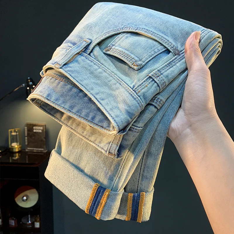Light blue jeans for men in summer 2025, slim design, fashionable, high-end, loose, casual, versatile, elastic cropped pants