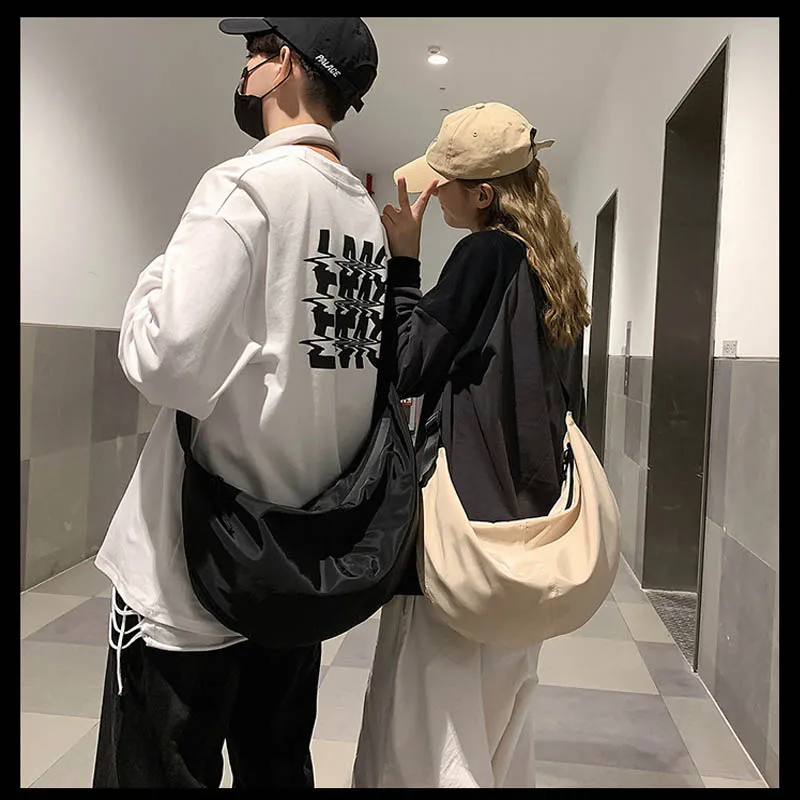 Bolso de un solo hombro para hombre y mujer, de gran capacidad nueva mochila, bolso de bola de masa hervida Simple, tendencia de moda, bolso de mensajero