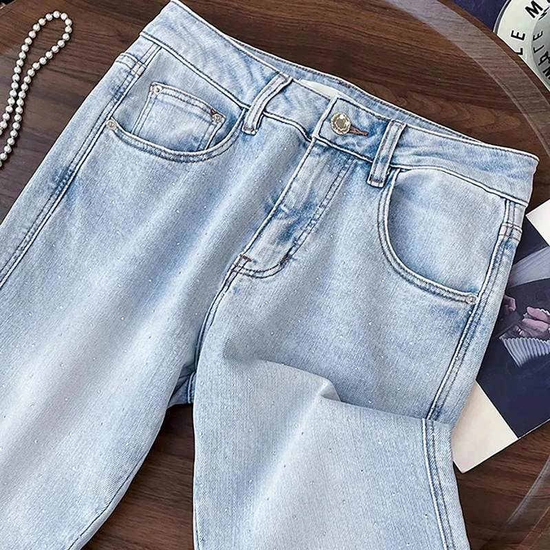 แฟชั่นเพชร Rivet กางเกงยีนส์ผู้หญิงอินเทรนด์ Hollow Out เย็บปักถักร้อย Flared Denim กางเกงข้อเท้ายาวกางเกงยีนส์สีน้ําเงินกางเกง Slim