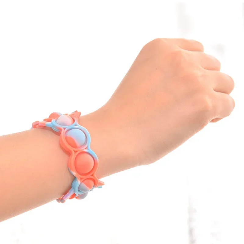 Pops Bubble Semplice fossetta Giocattolo Il suo braccialetto in silicone antistress Fidget Ansia Giocattoli sensoriali per bambini autistici