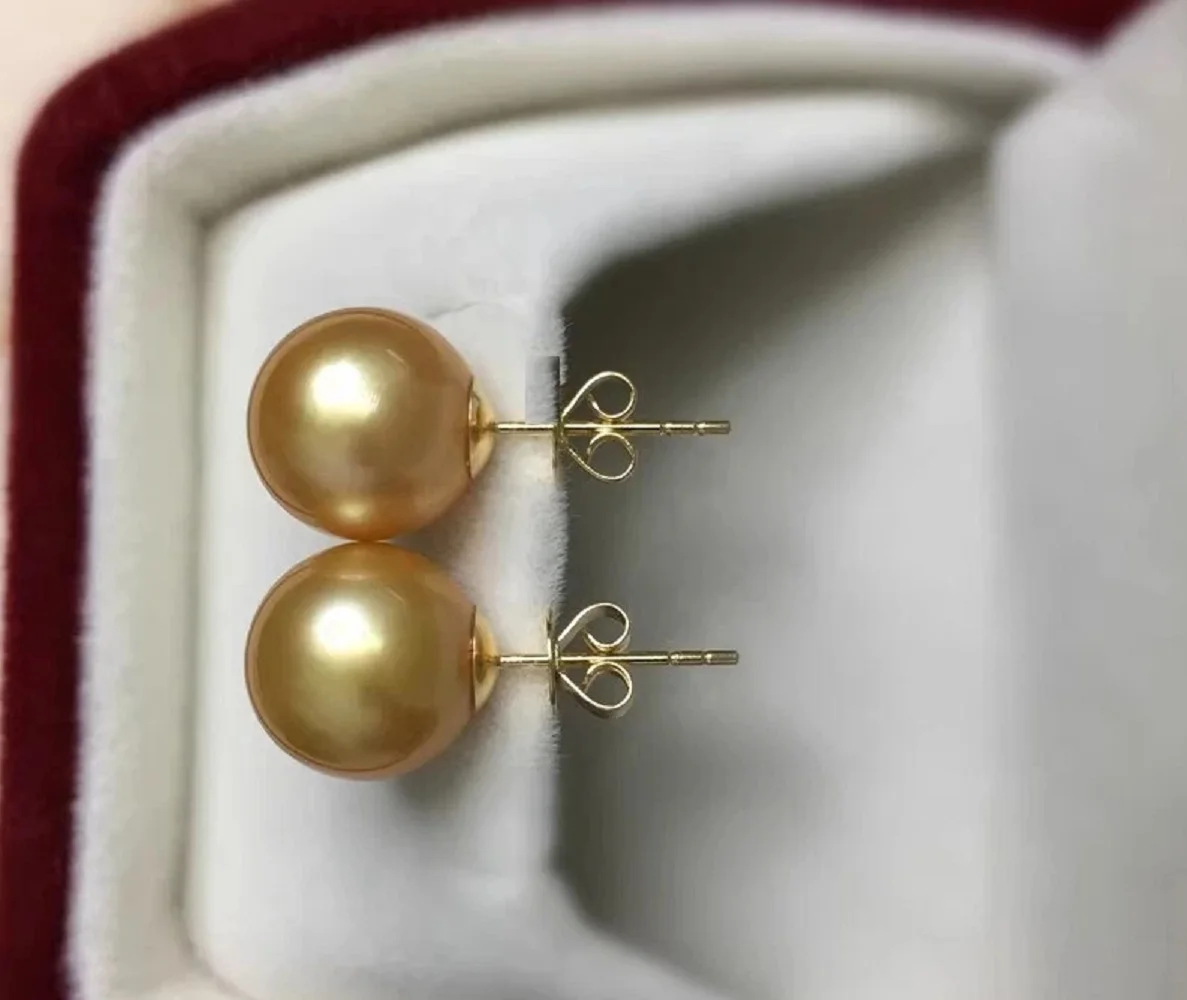 

Великолепные круглые серьги с жемчугом из золота Южных морей диаметром 10–11 мм из 14-каратного золота