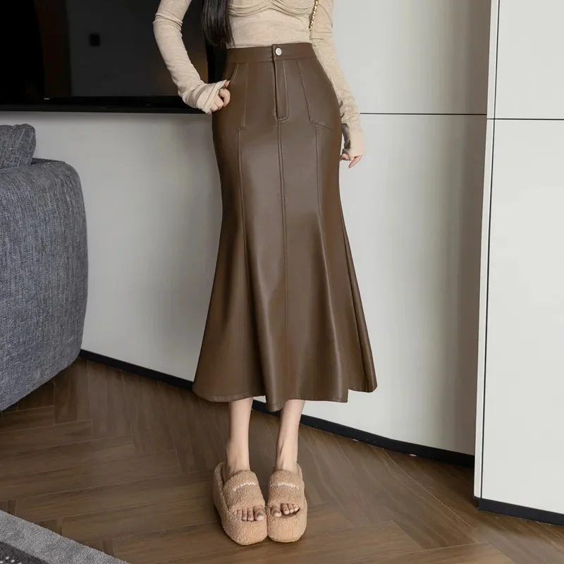 خمر عالية الخصر بولي Leather التنانير الجلدية للنساء 2026 الخريف الشتاء جديد عصري ذيل السمكة ملفوفة قلم رصاص التنانير الإناث #2