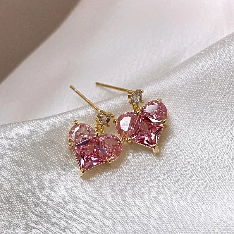 

925 silver nee dle pink love stud earrings female Korean version super flash temperament simple peach heart earrings light