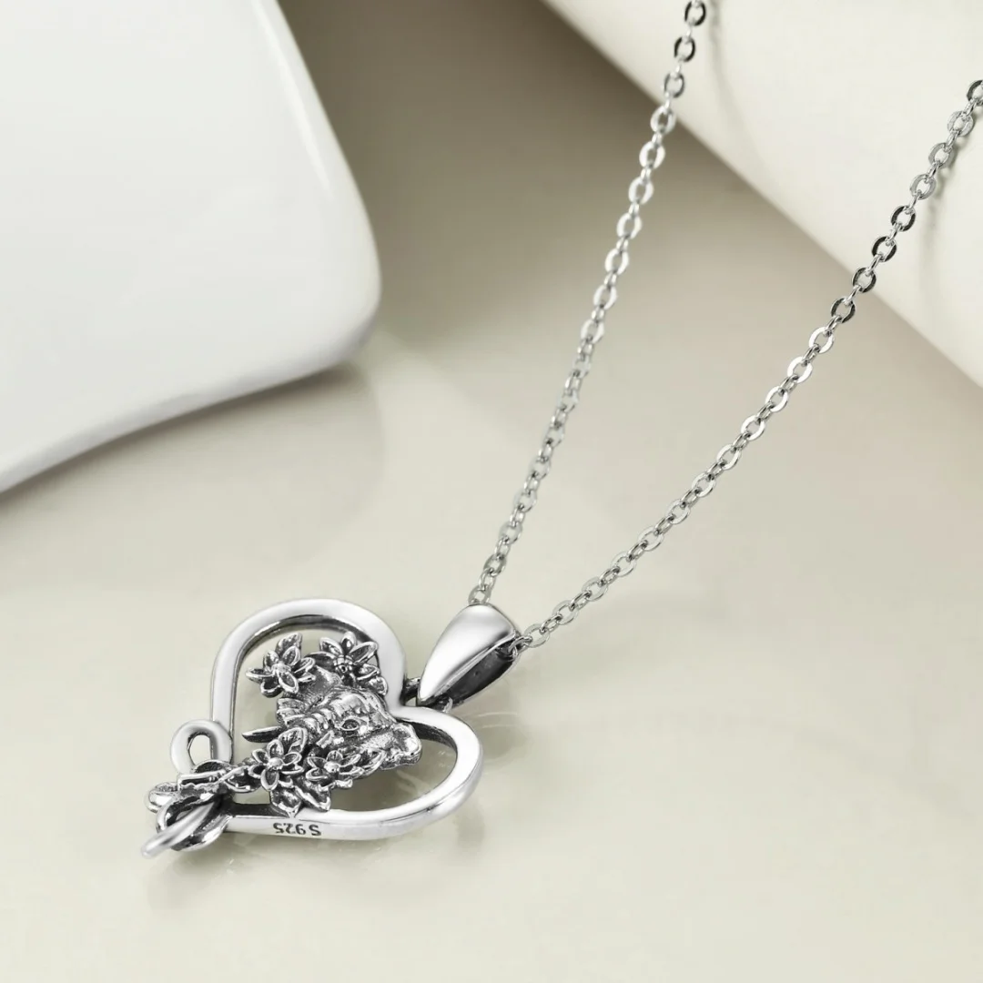Cross-border best-selling new European and American style Indian vintage flower elephant head hollow heart-shaped pendant neckla