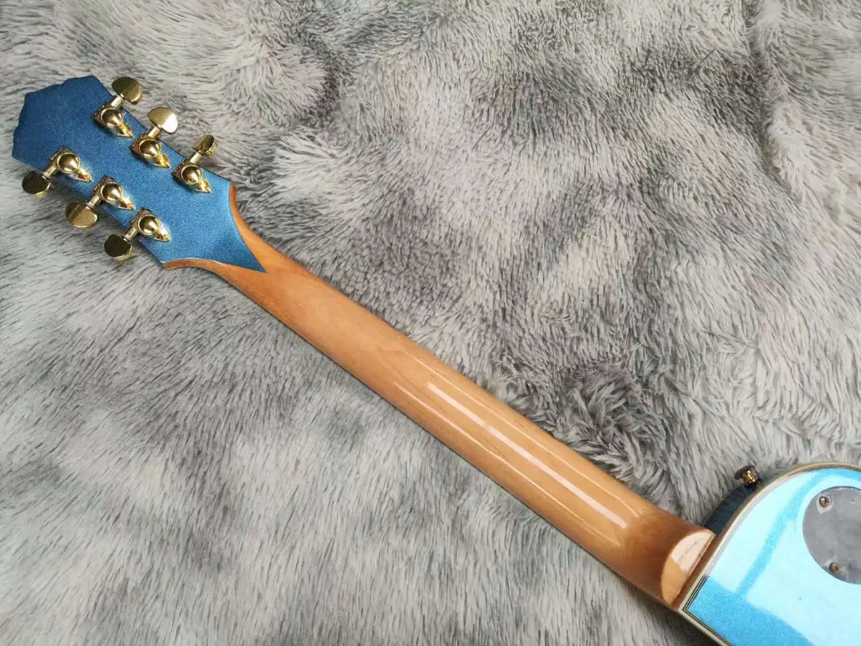 Electric guitar, with an unusual shape. High-quality, mahogany, 30-day production.