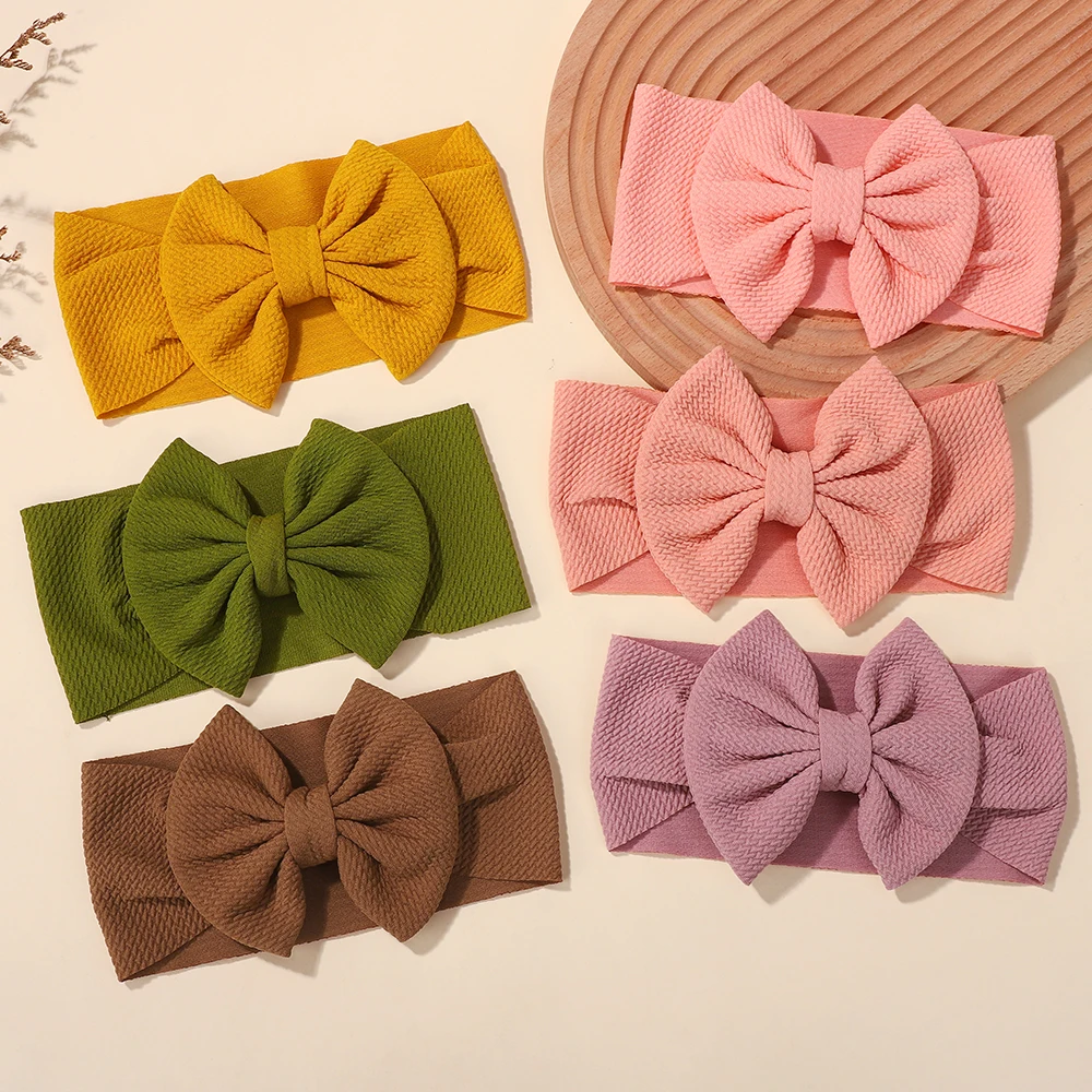 

12Pcs/lot big bows elastic headscarf for baby infant solid color casual headband Children hair accessories that do not harm hair