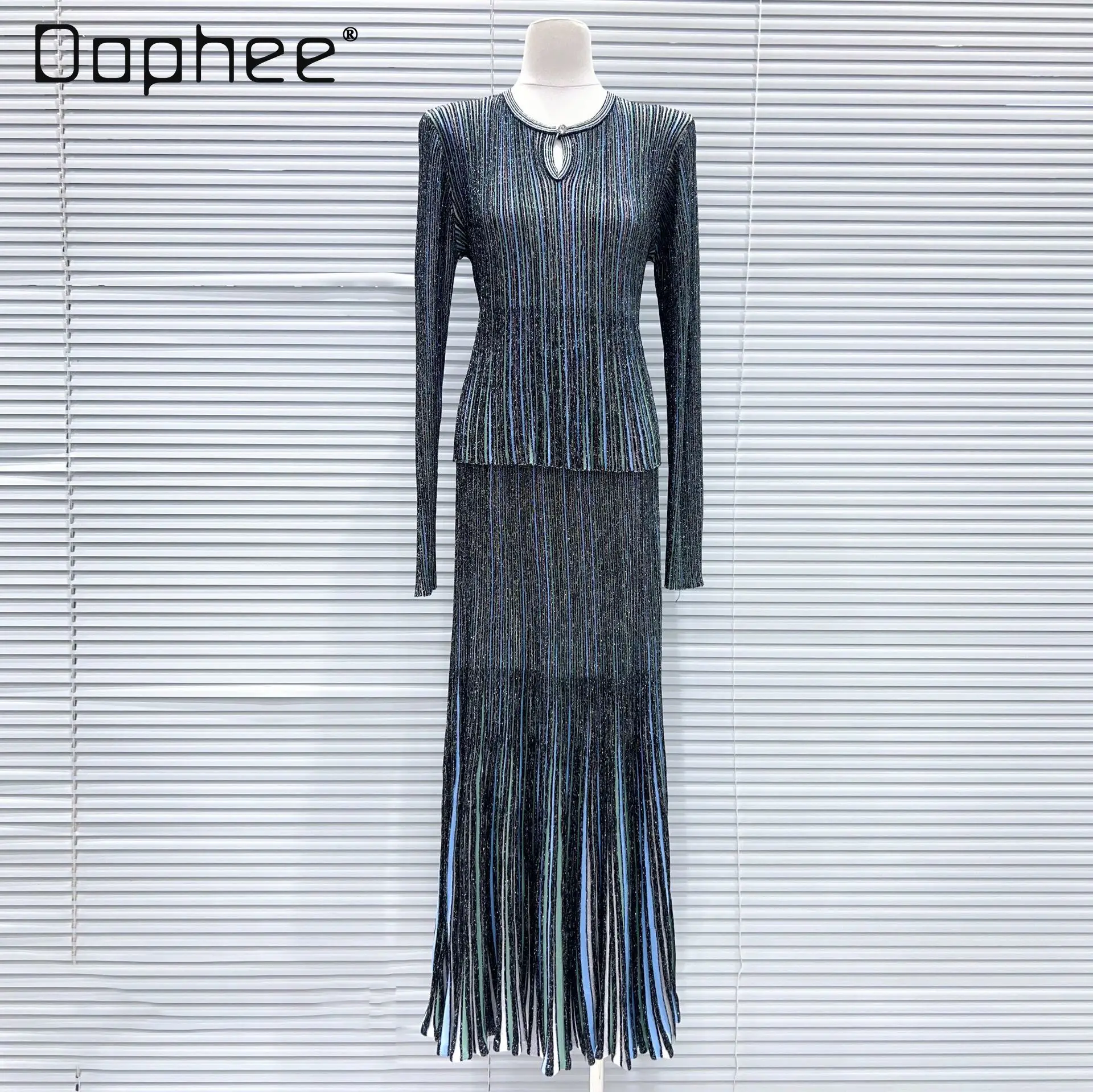 

2026 Spring Summer New Contrasting Colors Vertical Stripes Hollow Round Neck Long-sleeved Knitted Top Slim Tassel Skirt Sets