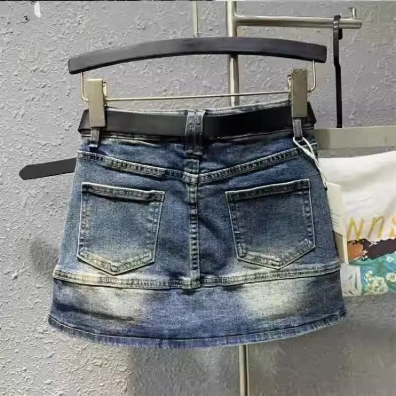 夏の新デニムスカート女性の 2025 レトロオールドハイウエスト一言抗光ミニスカート