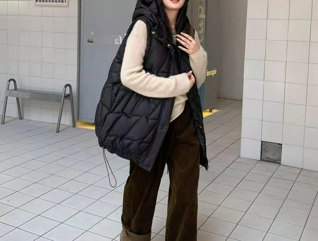 Chaleco de algodón a la moda Otoño Invierno 2025 nuevo chaleco con capucha Chaqueta de algodón suelta versátil