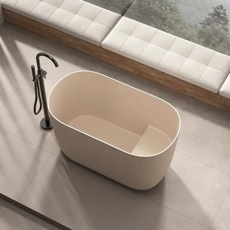

Small apartment family bed and breakfast sitting bathtub artificial stone integrated oval bathtub