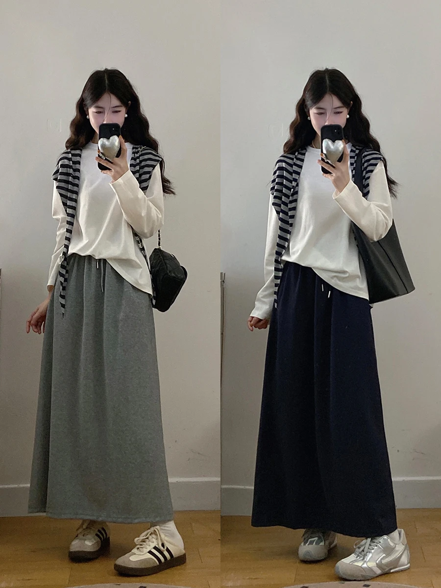 

Комплект из трех предметов для женщин больших размеров: футболка с полосками в корейском стиле, юбка с завышенной талией и эффектом похудения, повседневный комплект из хлопка для ранней осени