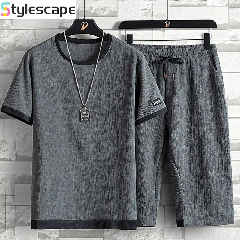 

Ice Silk Suit Men's Summer Loose Plus Casual Sports Suit Trendy Linen Men's Short Sleeved Seven Quarter Pants Two-piece Set