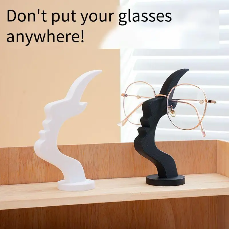Sculpturalny stojak na okulary: elegancki kształt siluety twarzy zapewniający bezpieczeństwo okularów i stylowy, minimalistyczny profil twarzy jako podstawka pod okulary.