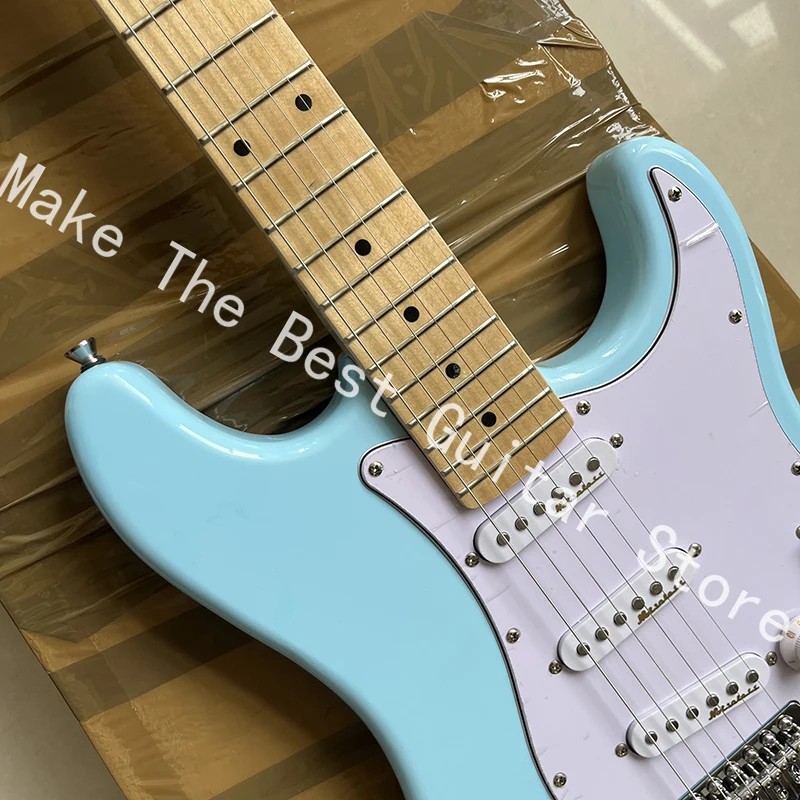 Exquisite bright blue electric guitar, tremolo bridge, professional level, fast delivery.