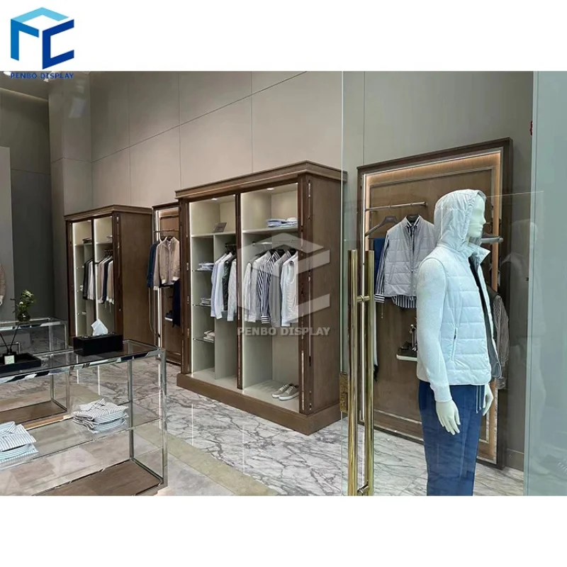 

2025customized.Store Inner Clothing Shop Design And Making Cloth Kiosks Mall Men Clothing Display Furniture Menswear Shop