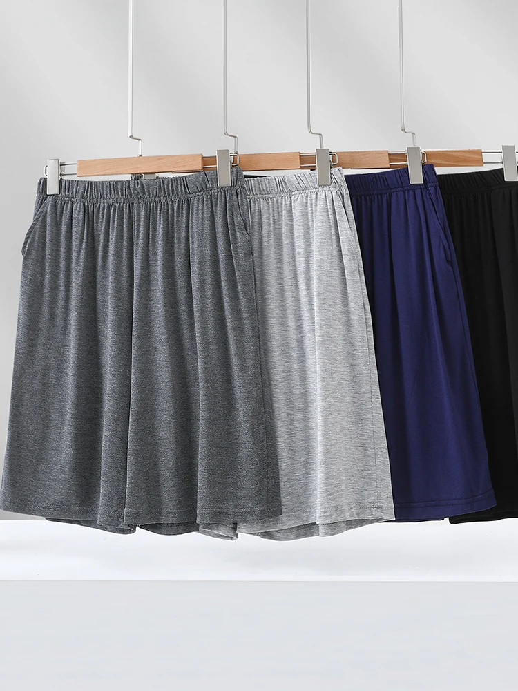 

Модальные мужские домашние брюки Тонкие домашние брюки с большими ортами Свободные брюки можно носить на улице Широкие повседневные брюки Простые летние брюки...