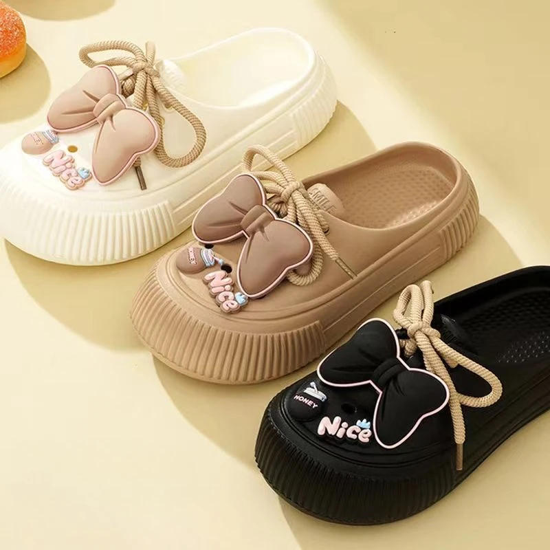 

Women's slippers, cute bow for outdoor wear, summer new fashion, home anti slip, thick sole, two on soft sole, perforated shoes