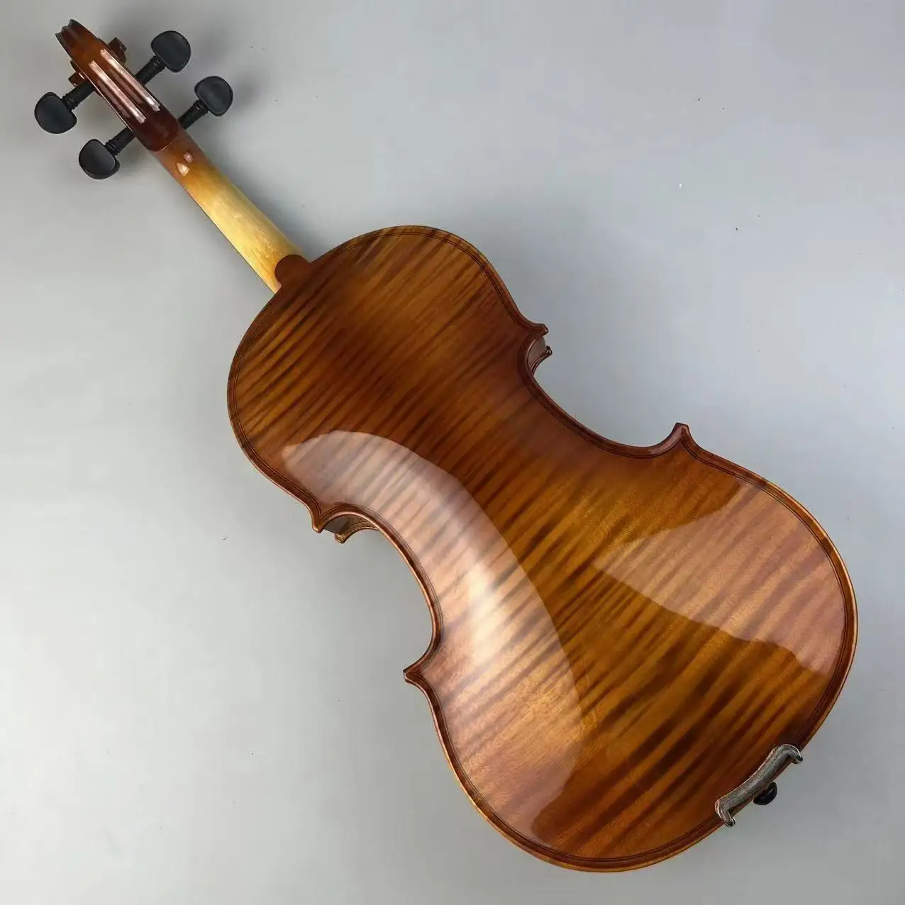 4/4 violin with triangular box, ebony bow, plastic shoulder support, spare strings