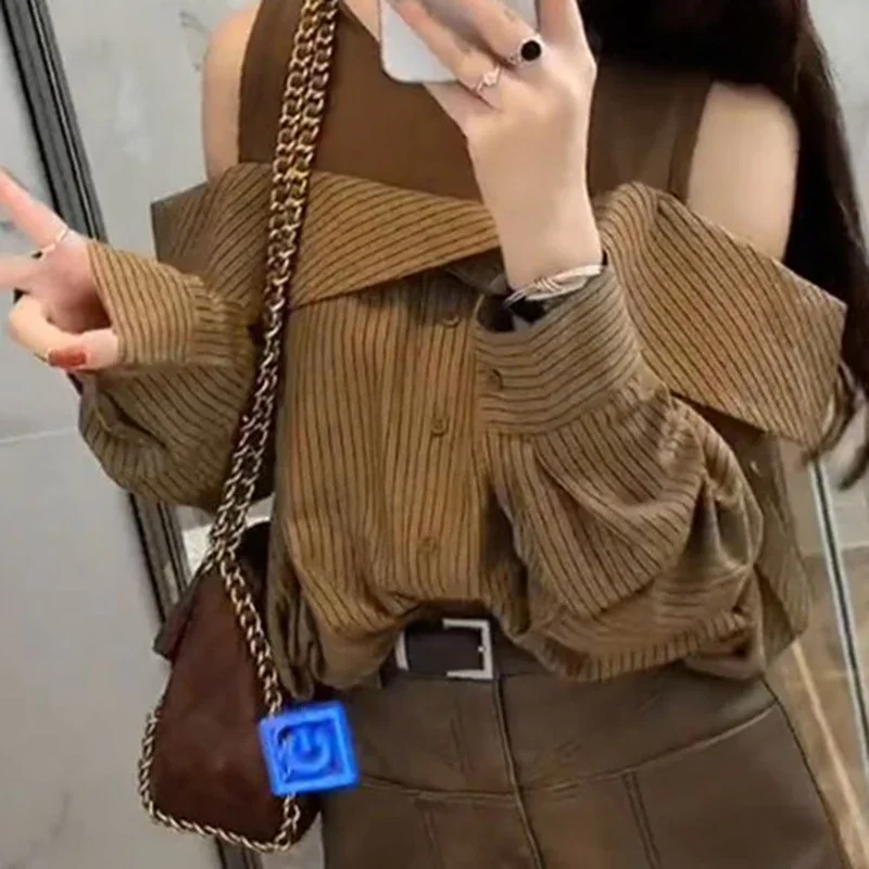 

2025 new women's loose long-sleeved top design sense niche female Striped fake two-piece off-the-shoulder shirt female autumn