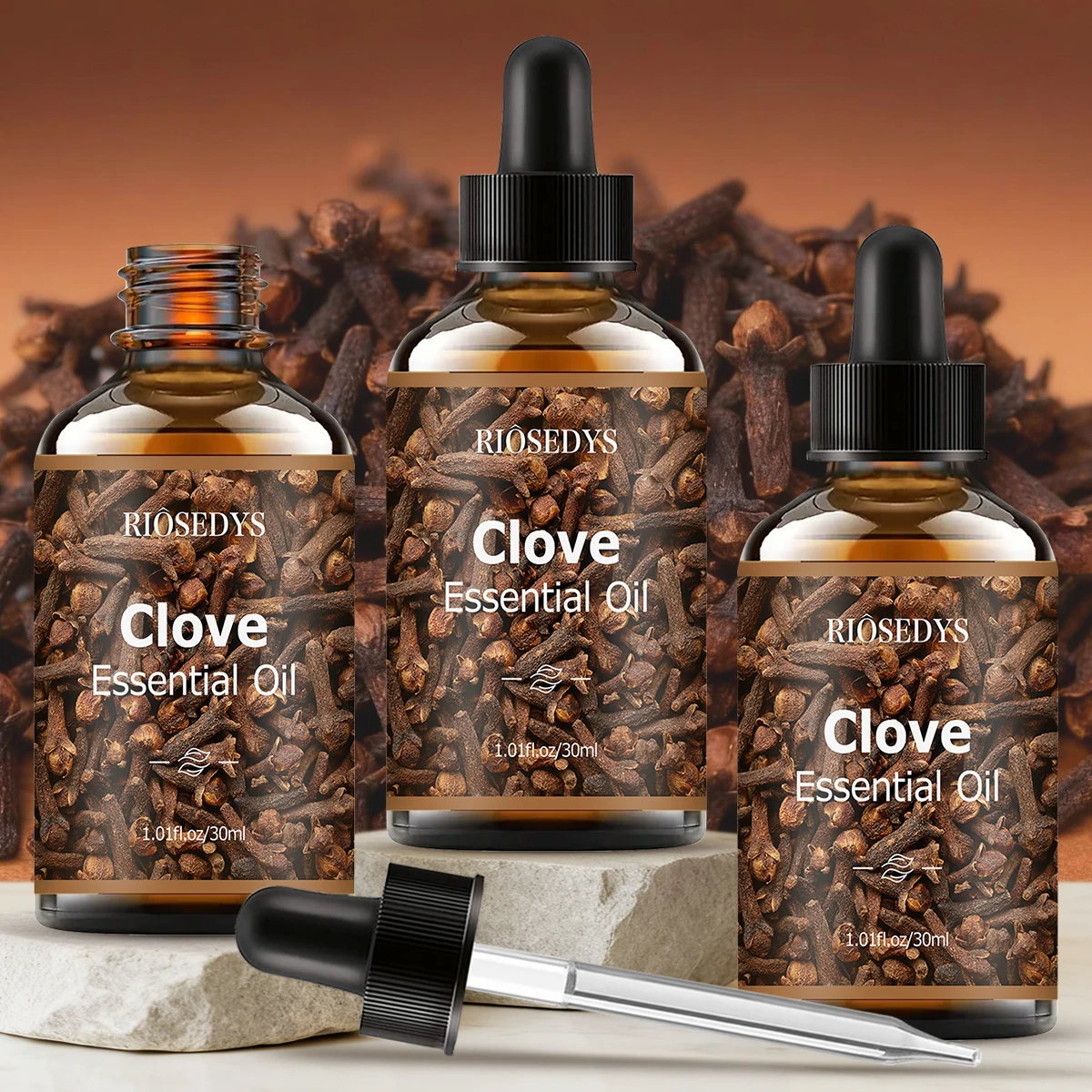 زيت القرنفل العطري، ذو رائحة خشبية، مناسب لتدليك الجسم والعناية بالشعر، ويمكن أيضًا في العلاج العطري. #1