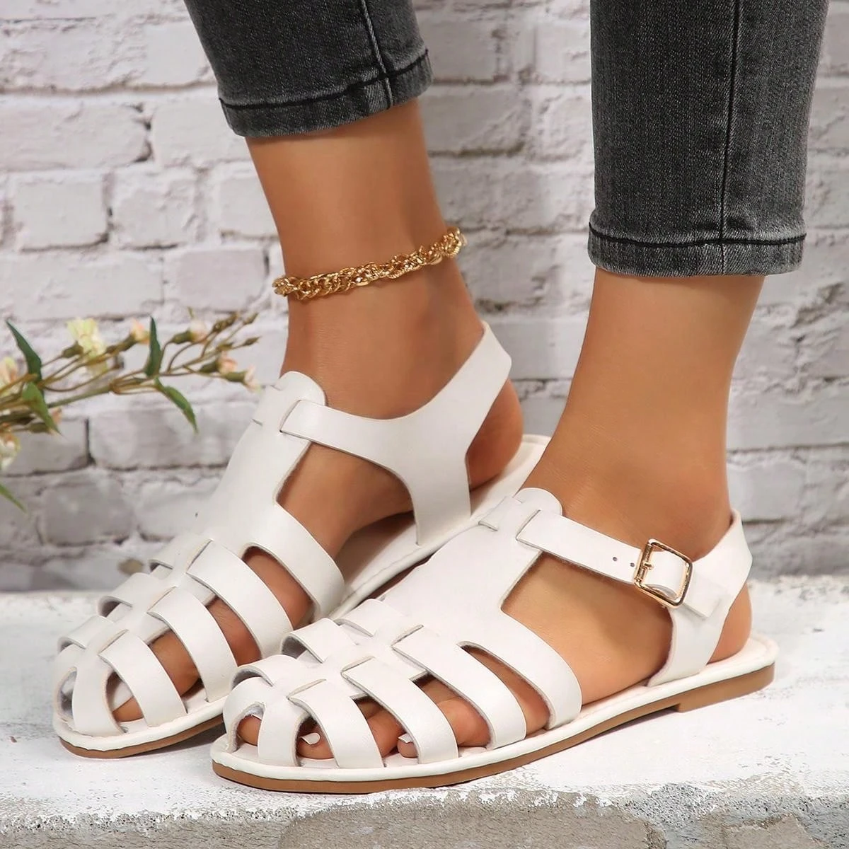 

Women's Summer Roman Style Soft-soled Comfortable Toe-cap Sandals 2026 New Anti-slip Hollow Breathable Simple Flat Sandals