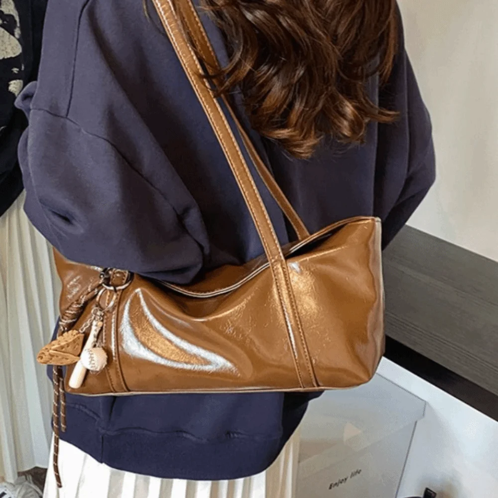 

Korean Style Boston Pillow Bag Solid Color Minority Design Pu Dumpling Bag with Pendant Commuting Retro Underarm Bag Travel
