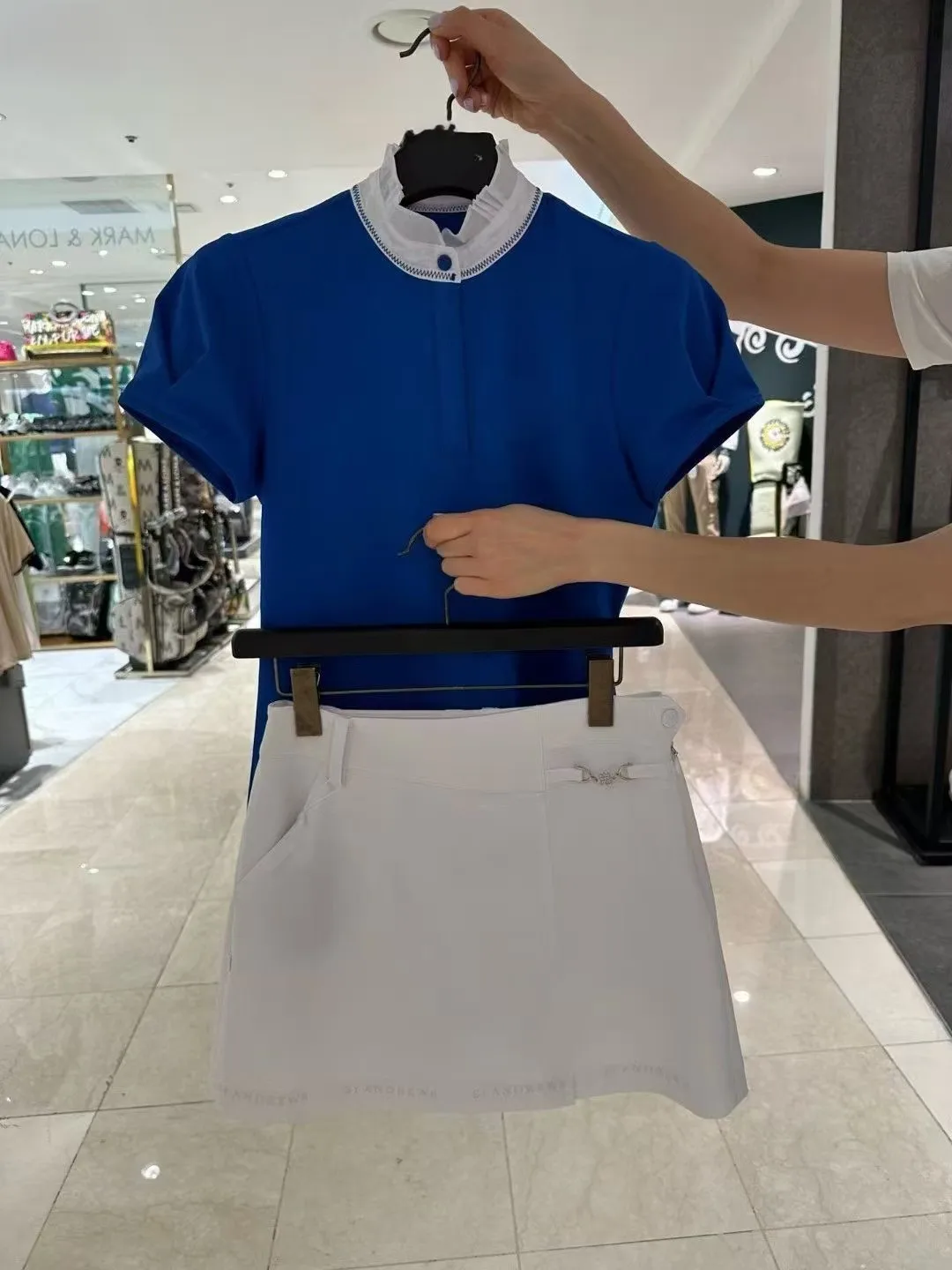 

Women's Golf Lace Stand-Up Collar Short-Sleeve Top: Flattering and Versatile