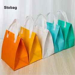 StoBag 10pcs Lunch Box Bag Packaging Non tessuto Tote portatile Food Drink Storage consegna Cooler Carrier sacchetti Logo personalizzato