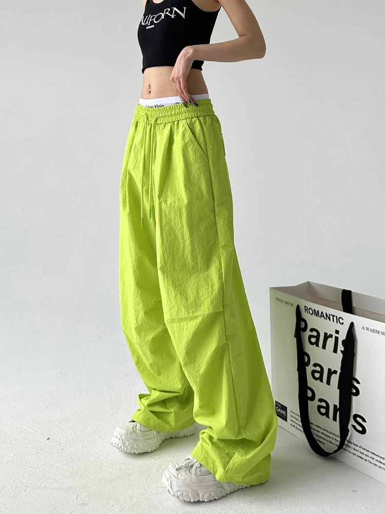 กางเกงกีฬาฟลูออเรสเซนต์สำหรับผู้หญิง ทรงลำลอง ขาตรง ช่วยให้ดูผอม สไตล์สตรีท สวมใส่สบาย เอวสูง กางเกงขายาว