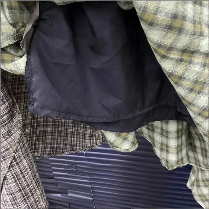 KBQ Hit Color Irregular Hem Skirts for Women High Waist Temperament Small Niche Design American Fashion Plaid Short Skirt Female