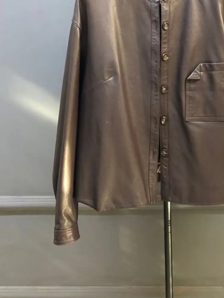 سترة منفوخة بلون سادة من الجلد الطبيعي على الطراز الكوري فضفاضة وجيب واحد الصدر وأكمام طويلة من جلد الغنم ملابس خارجية للسيدات