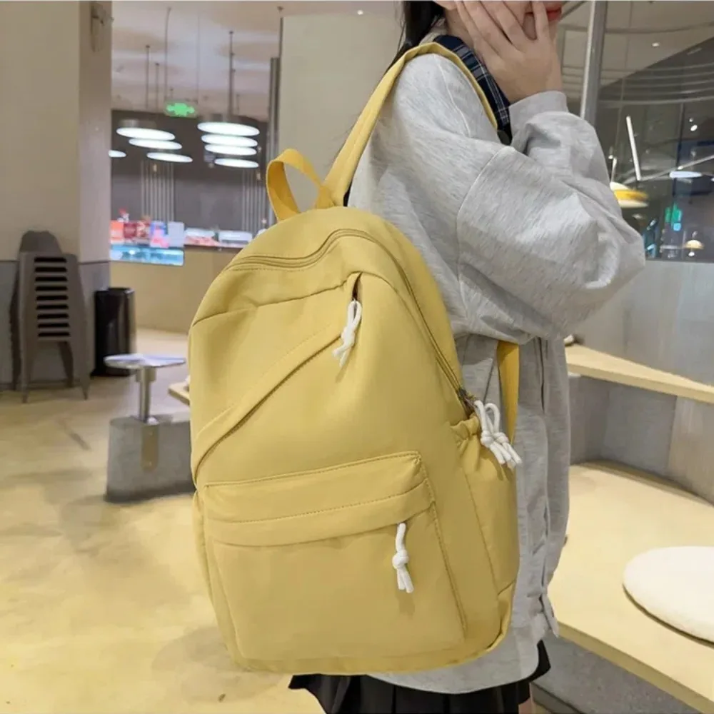 Mochila escolar de gran capacidad para estudiantes, bolso de viaje impermeable de nailon de Color sólido para mujeres y adultos